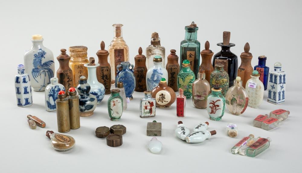 A GROUP OF 50 SNUFF BOTTLES AND MEDICINE BOTTLES, c. 1920s sold by Galerie Zacke, lot 957 — auction record photograph