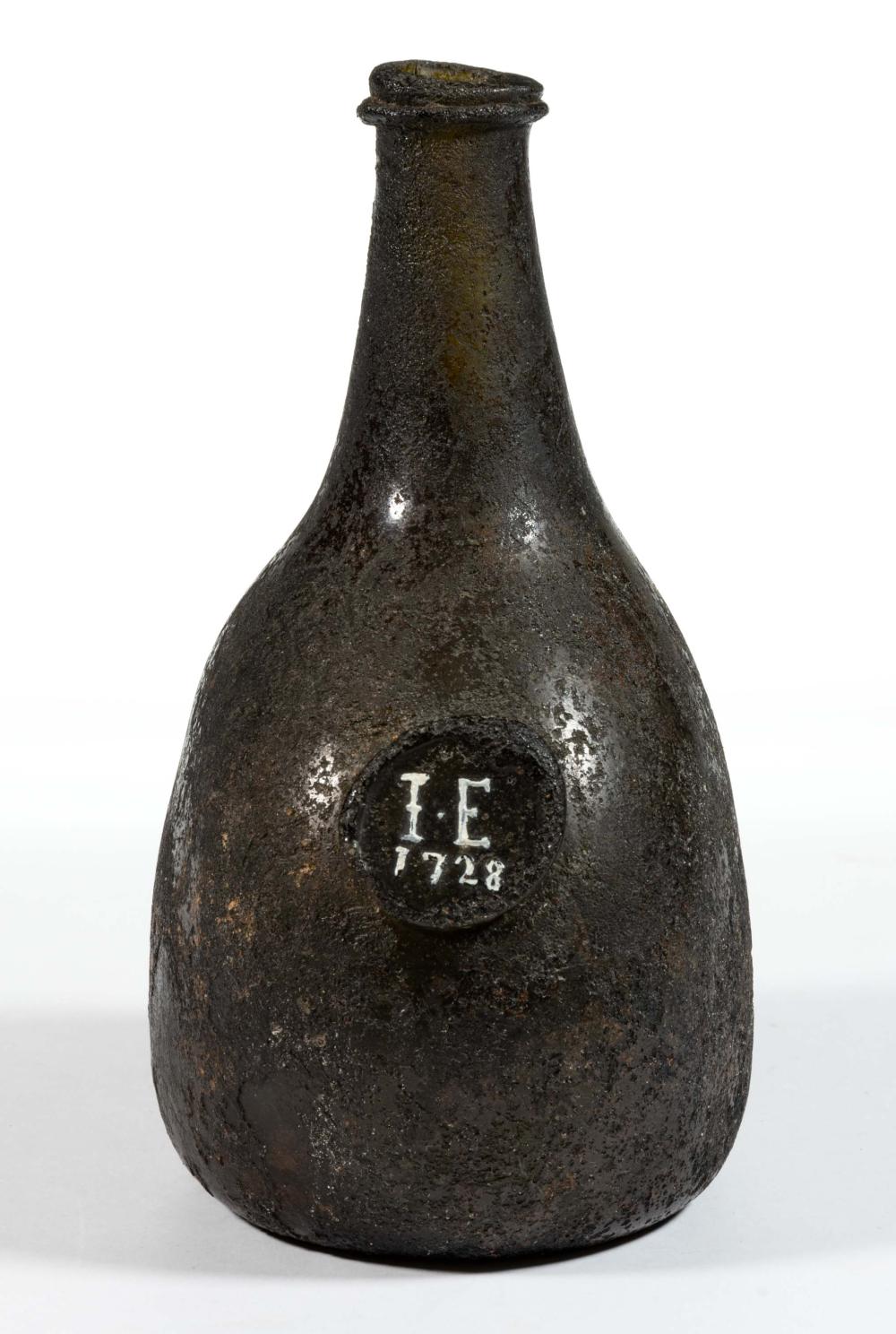 ENGLISH DATED 1728 APPLIED SEAL BLACK GLASS BLADDER ONION / UTILITY BOTTLE sold by Jeffrey S. Evans & Associates, lot 373 — auction record photograph