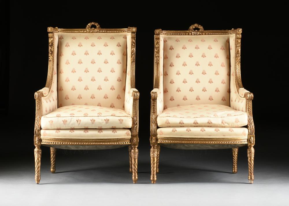 A PAIR OF LOUIS XVI STYLE GILTWOOD BERGÈRES OREILLES, ATTRIBUTED TO MAISON JANSEN, FRENCH, MID 20TH CENTURY sold by Simpson Galleries, LLC, lot 379 — auction record photograph