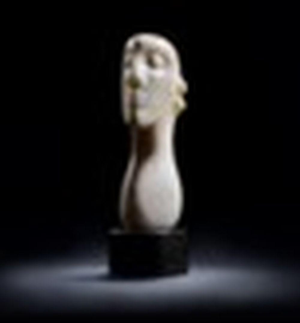 Henry Moore, O.M., C.H. (1898-1986) Head 8 in. (20.4 cm.) high, excluding b comparable sale