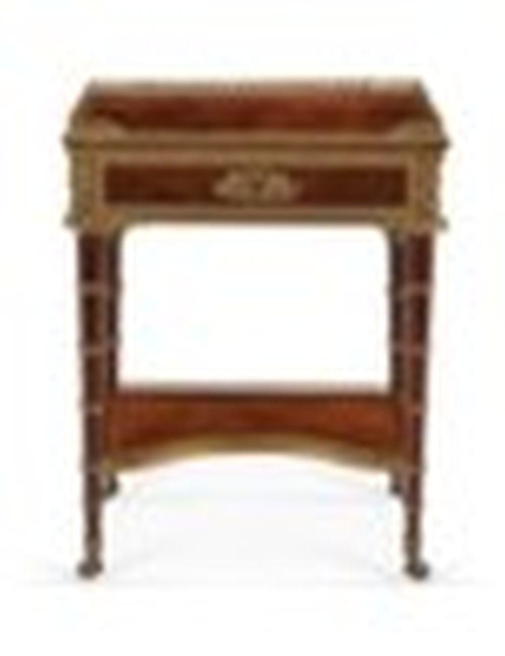 Antoine Guillemet comparable auction result: a french ormolu mounted mahogany occasional table after the model by jean