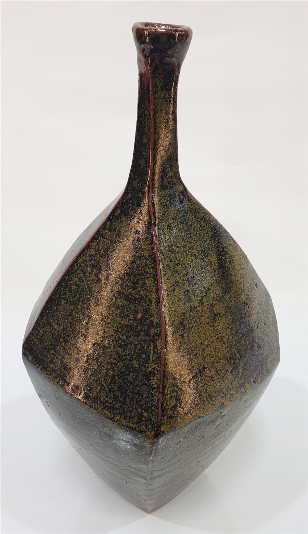 col levy australia 1933 a stoneware bottle vase with assymetric faceted sides impressed maker s mark to base height 32 cm · Raffan Kelaher & Thomas · 2024-03-26 Col Levy comparable auction result: col levy australia 1933 a stoneware bottle vase with assymetric faceted sides impressed maker s mark to base height 32 cm