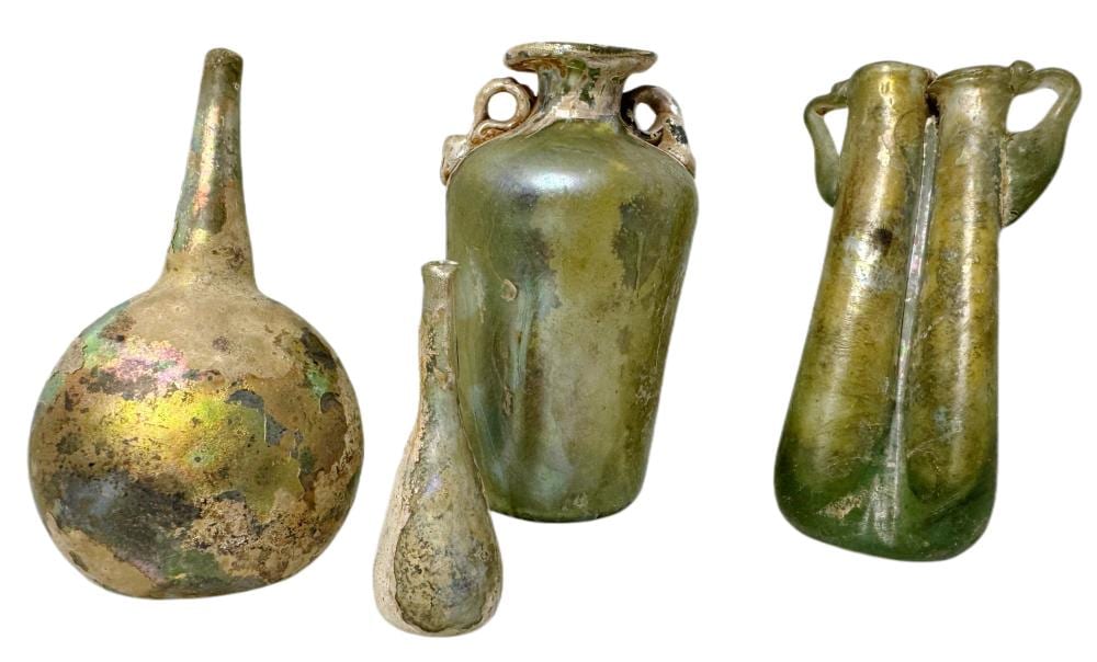 Lot of Four Ancient Roman Iridescent Glass Double Alabastron Tear Glasses Perfume Bottles Amphora Balsamarium Unguentarium Ampulla sold by Hess Fine Art, lot 4031 — auction record photograph