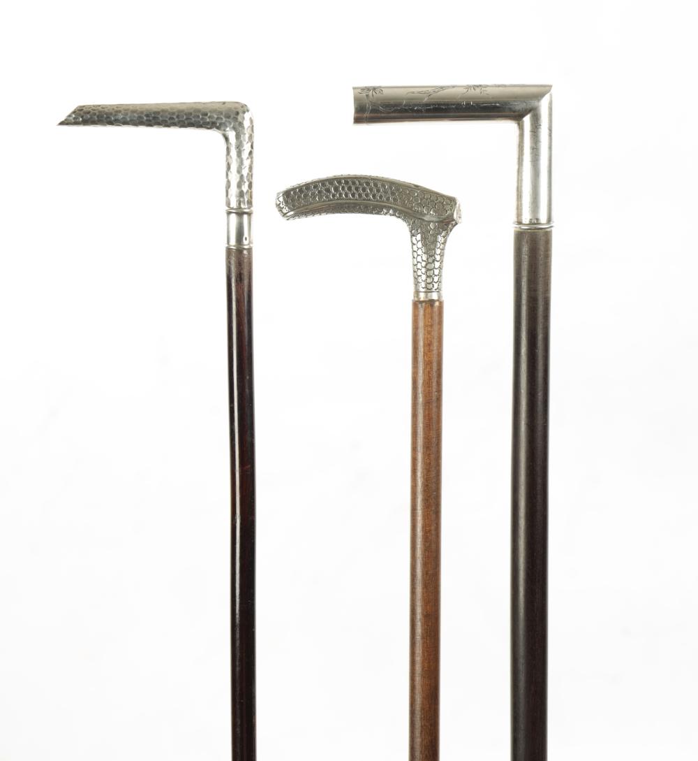 A COLLECTION OF THREE LATE 19TH CENTURY SILVER TOPPED WALKING STICKS sold by Hutchinson Scott Limited, lot 774 — auction record photograph