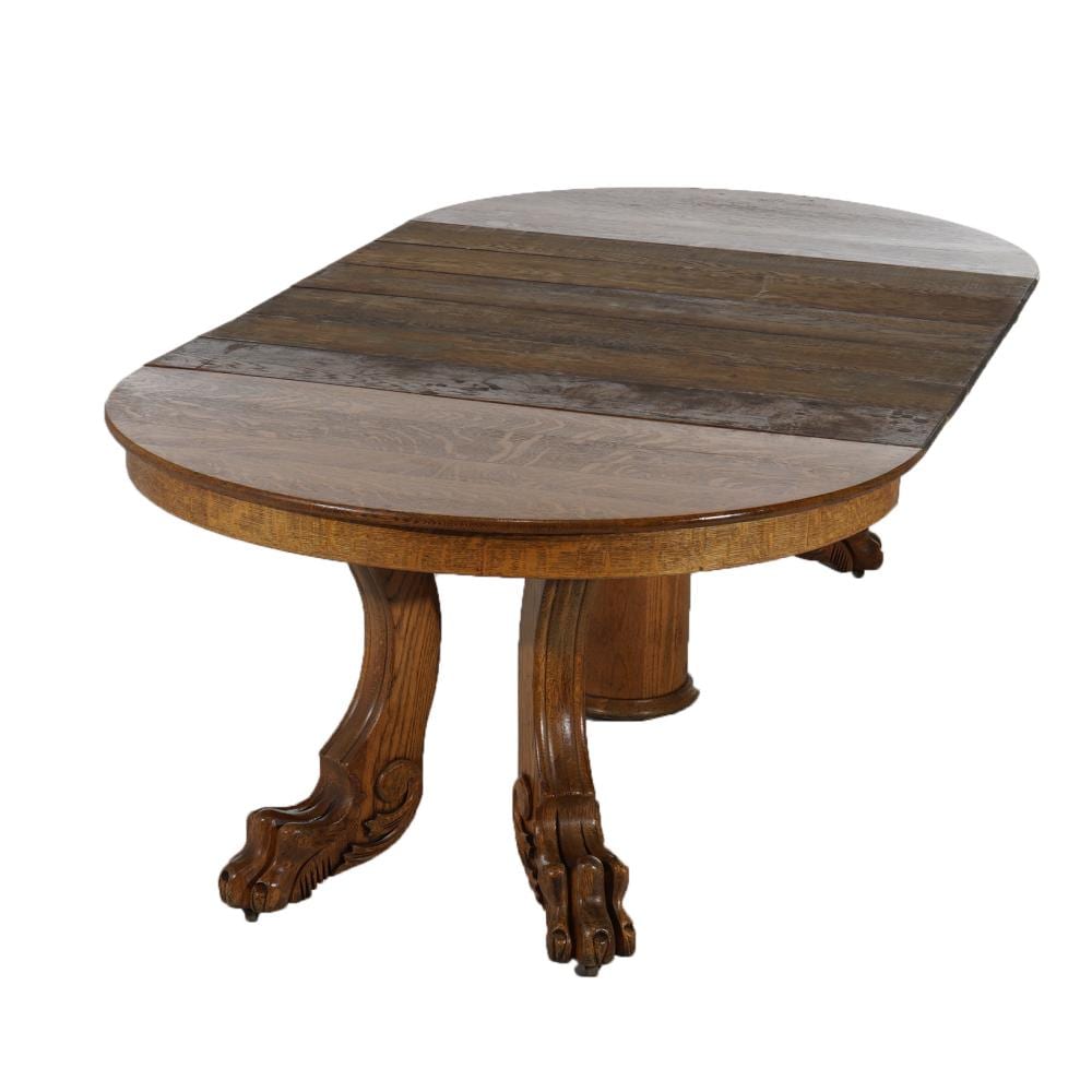 Horner School Round Carved Oak Clawfoot Dining Table & Six Leaves C1920 sold by Winfield Auction Gallery, lot 4328 — auction record photograph