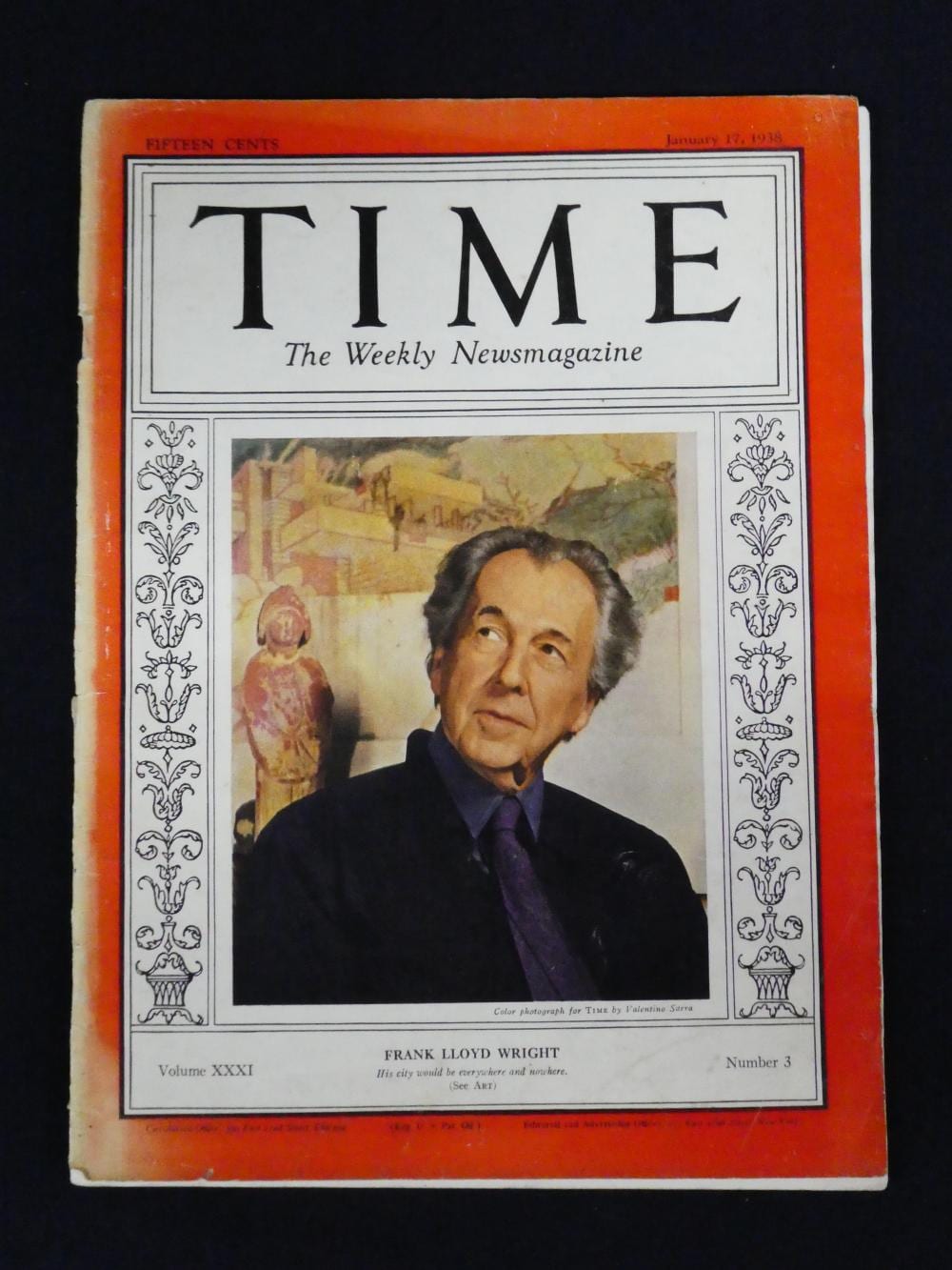 Front cover of TIME magazine featuring a portrait of Frank Lloyd Wright, with “TIME” and “The Weekly Newsmagazine” text on a white and orange border.