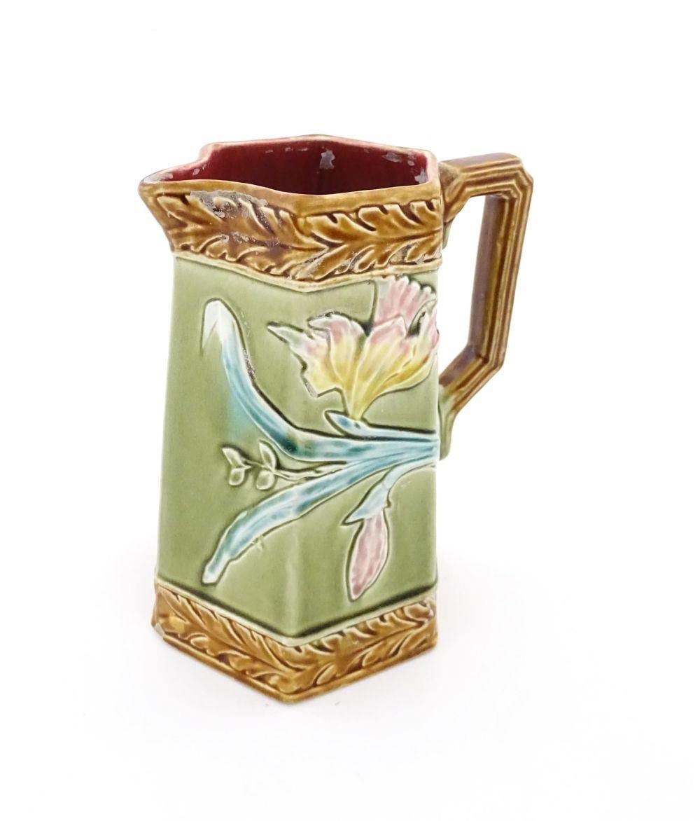 a french jugendstil art nouveau majolica jug of hexagonal form by gustave · Claydon Auctioneers · 2024-04-28 Gustave (1828) Colin comparable auction result: a french jugendstil art nouveau majolica jug of hexagonal form by gustave