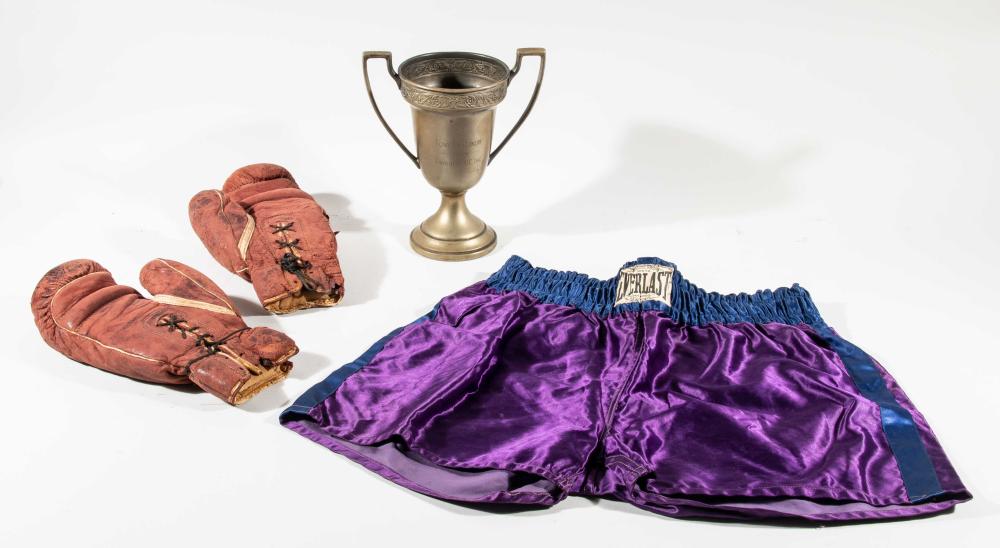 Tony Canzoneri fight attributed boxing gloves and trunks with trophy (Canzoneri Family documentation). sold by Hunt Auctions, lot 299 — auction record photograph