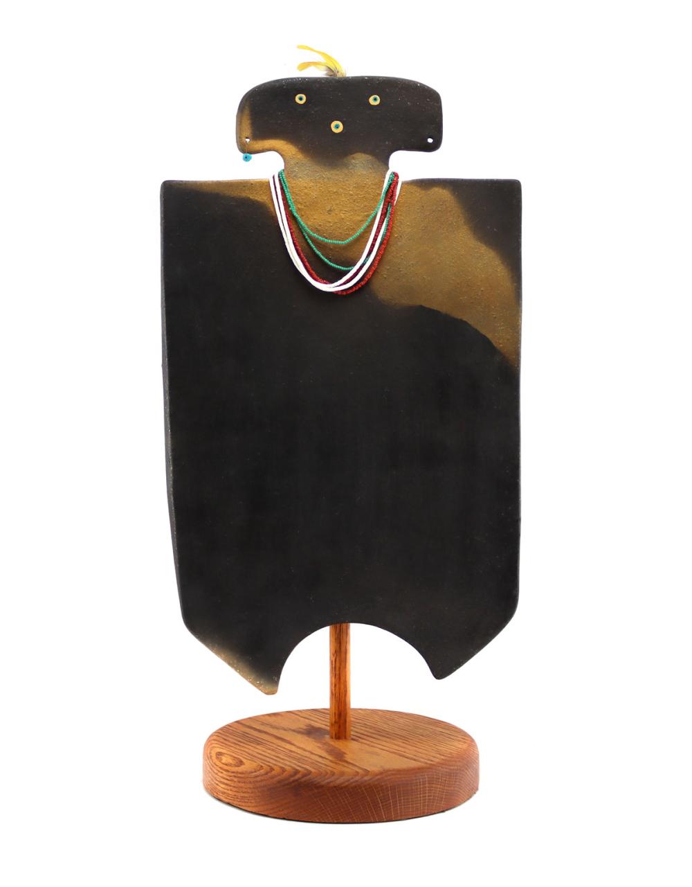 Nora Naranjo Morse comparable auction result: nora naranjo morse b 1953 santa clara pottery figurine with multi stone heishi necklace and feathers on a wooden stand c 1990s 21 x 10 25 x 8