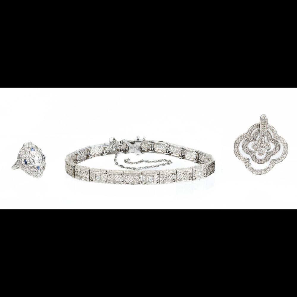Auction comp thumbnail for Ladies Ensemble of Filigree Jewelry: Antique Diamond and Platinum Ring and Bracelet plus 14K White Gold and Mille Diamon (Goldberg Coins & Collectibles, Lot 33)