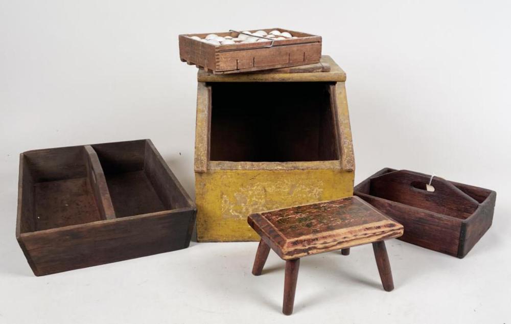Primitive folk art wooden containers and a small stool displayed together on a light background.