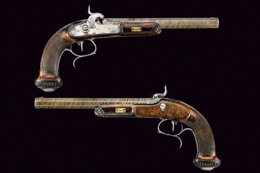 Marco Carna' comparable auction result: a pair of percussion target pistols by colombo