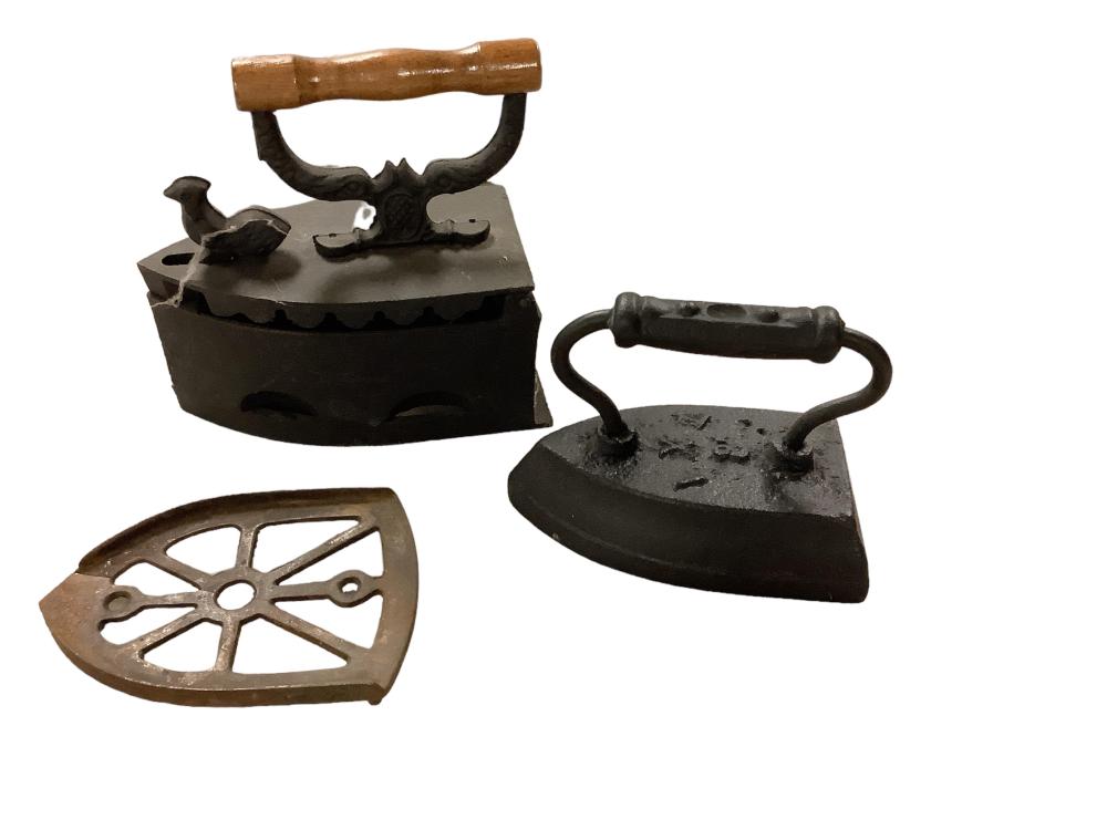 (2) Sad Irons sold by Apple Tree Auction Center, lot 1432 — auction record photograph