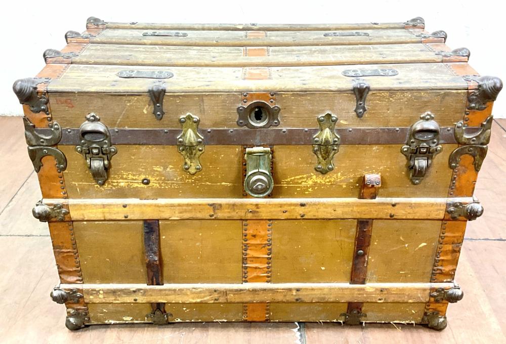 Antique Wood Steamer Trunk With Metal Accents sold by EJ'S Auction & Appraisal, lot 2178 — auction record photograph