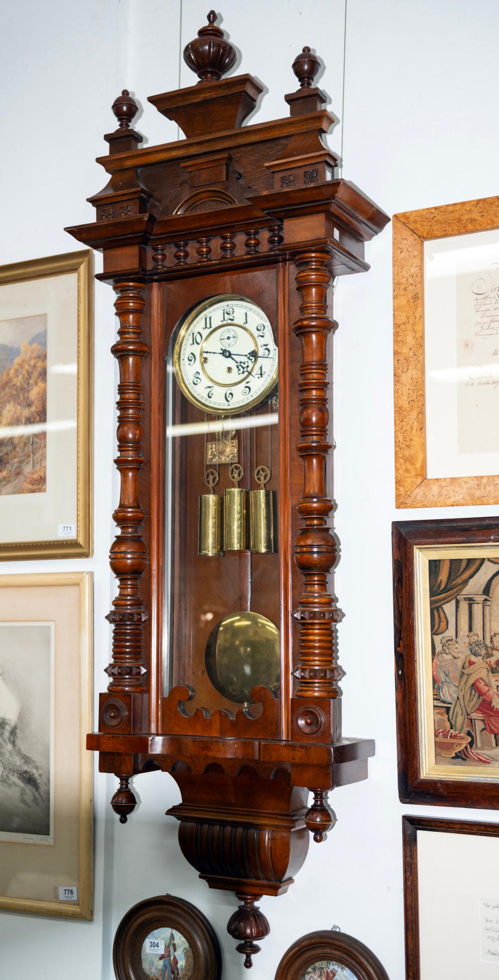 An antique German three weight Grande Sonnerie striking Vienna regulator wall clock in walnut case with turned column decoration, 19th century, 140cm high sold by Leski Auctions Pty Ltd, lot 189 — auction record photograph