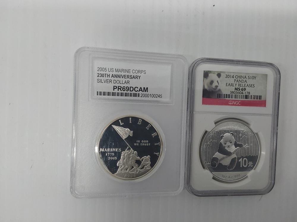 2 miscellaneous graded silver rounds · Freeman Yoder Auctions · 2024-07-16 Marine comparable auction result: 2 miscellaneous graded silver rounds