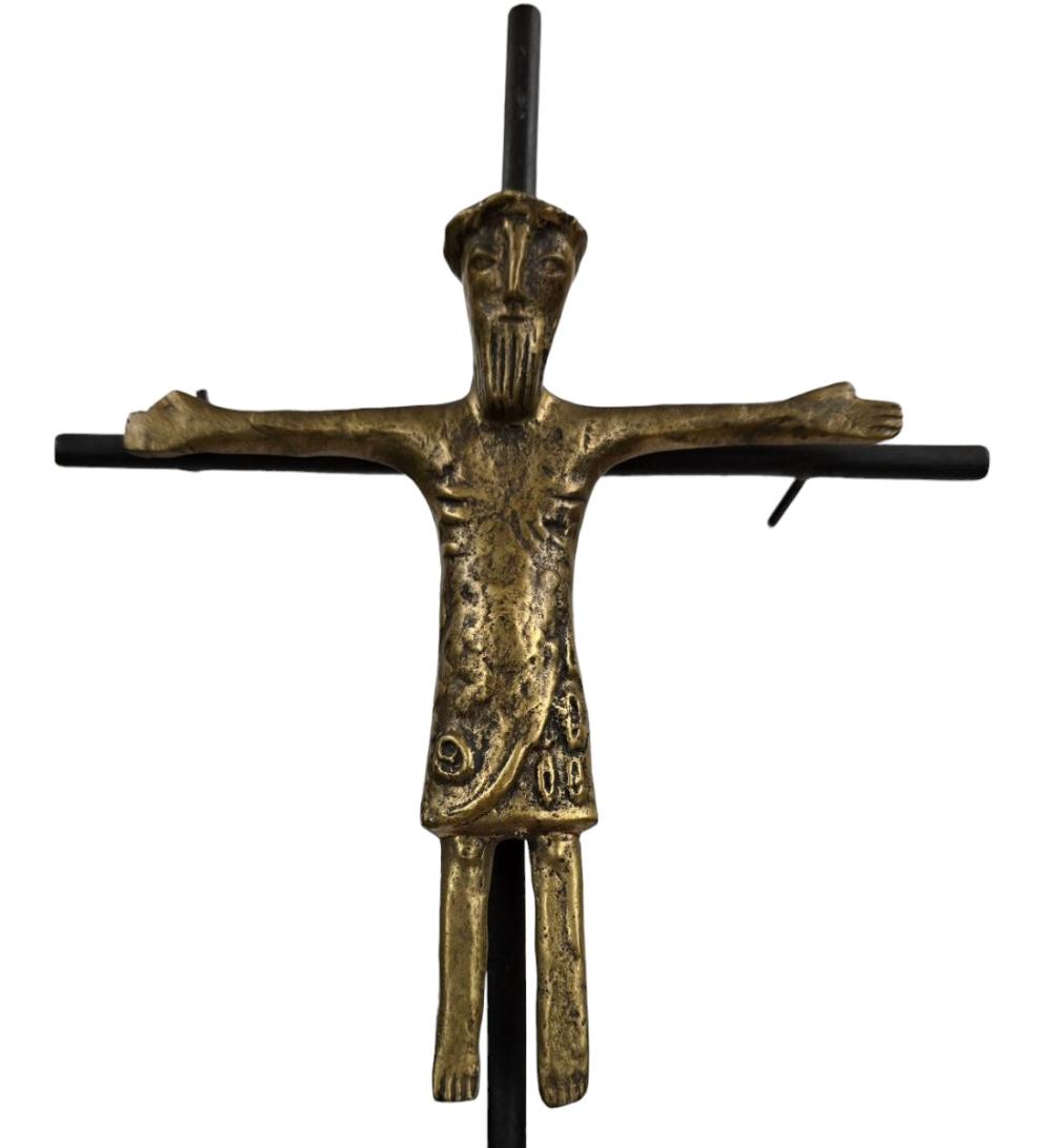 Gilded bronze crucifix figure of Jesus on a cross with arms outstretched, shown against a white background.