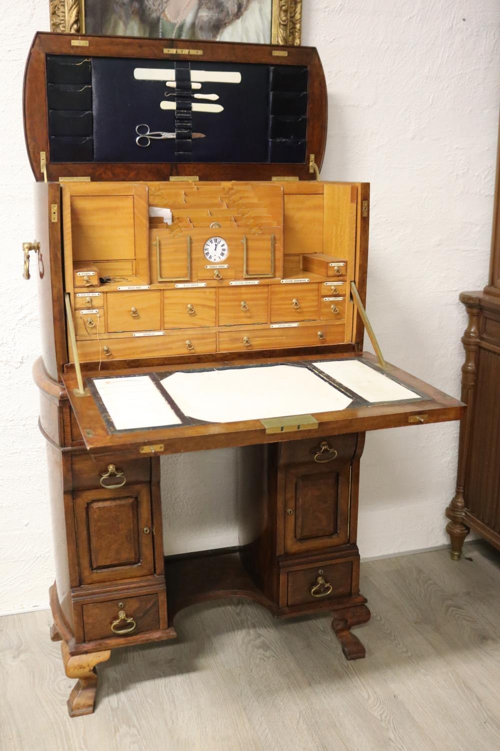 Hordern family secretaire cabinet. Antique figured walnut twin pedestal secretaire cabinet, with well fitted interior, (see pictures) displaying a central pocket watch slot, flanked by photograph slots, multiple… sold by Vickers & Hoad, lot 69 — auction record photograph