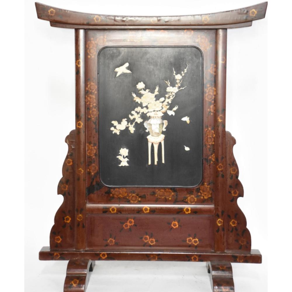 Auction comp thumbnail for A superb Japanese Meiji period chinoiserie table screen having central ivory and mother of pearl panel depicting birds and the floral urn. Having all over hand painted floral decoration and Mount Fuji to the reverse. H 88cm, W 70cm (Christian McCann Auctions, Lot 33)