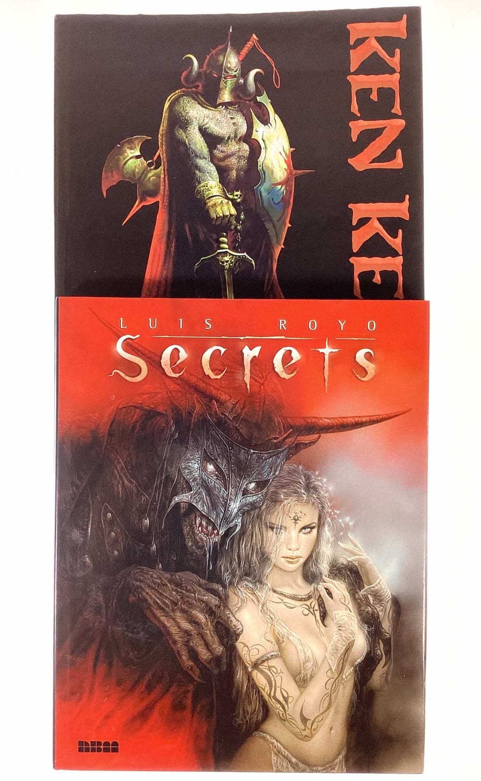 Ken Kelly comparable auction result: ken kelly luis royo hard cover art books