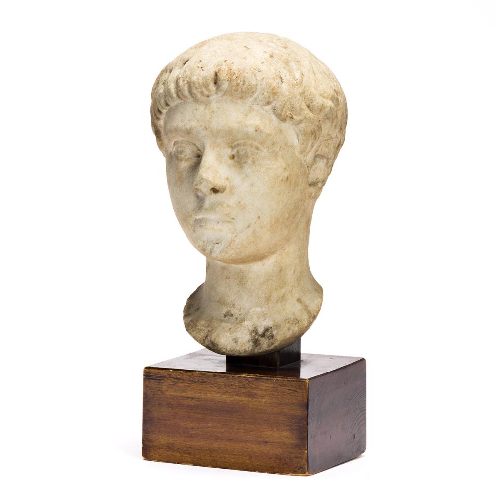 ROMAN BUST OF A YOUTH Head of A Boy. sold by Swann Auction Galleries, lot 97 — auction record photograph