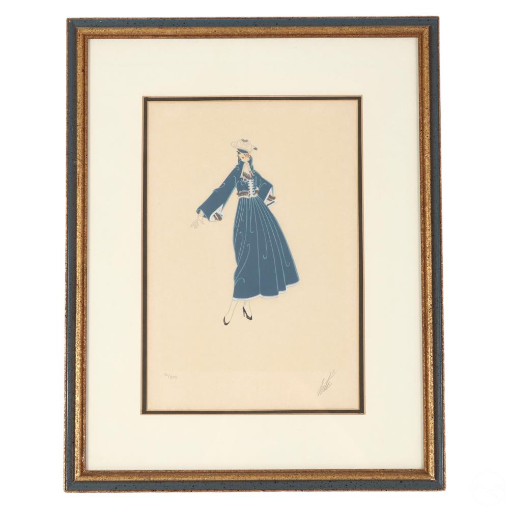 Framed fashion illustration print showing a blue dress-wearing woman in a hat, standing with arms at her sides.