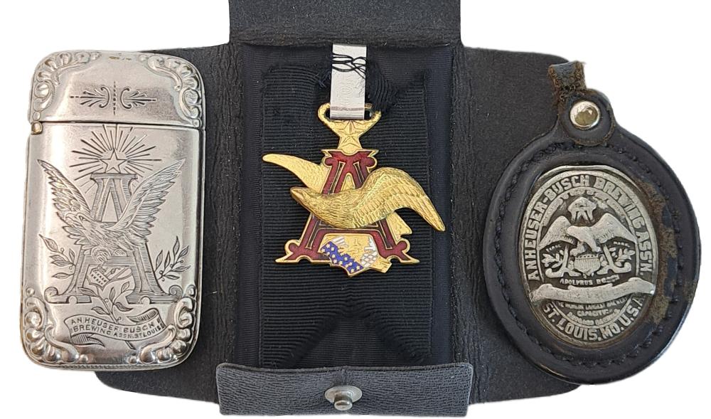 Lot Of Adolphus Busch Anheuser Original Products Watch Fob Match Safe Case Bottle Opener Keychain sold by Hess Fine Art, lot 8321 — auction record photograph