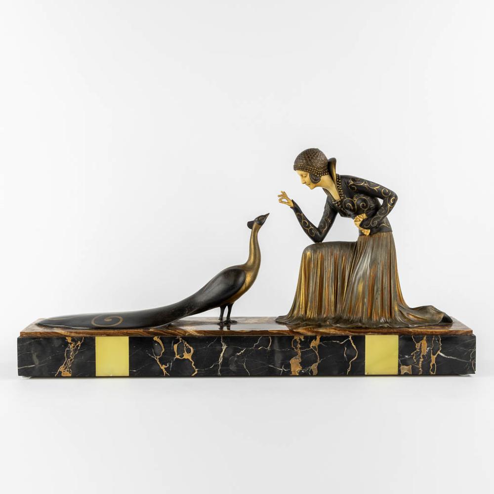 Ugo Cipriani comparable auction result: ugo cipriani 1887 1960 lady with a peacock art deco l 14 5 x w 71 x h 36 cm