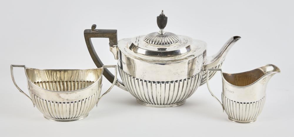 three piece half reeded silver tea service by will · Ewbank's · 2024-09-26 William (1872) Nicholson comparable auction result: three piece half reeded silver tea service by will