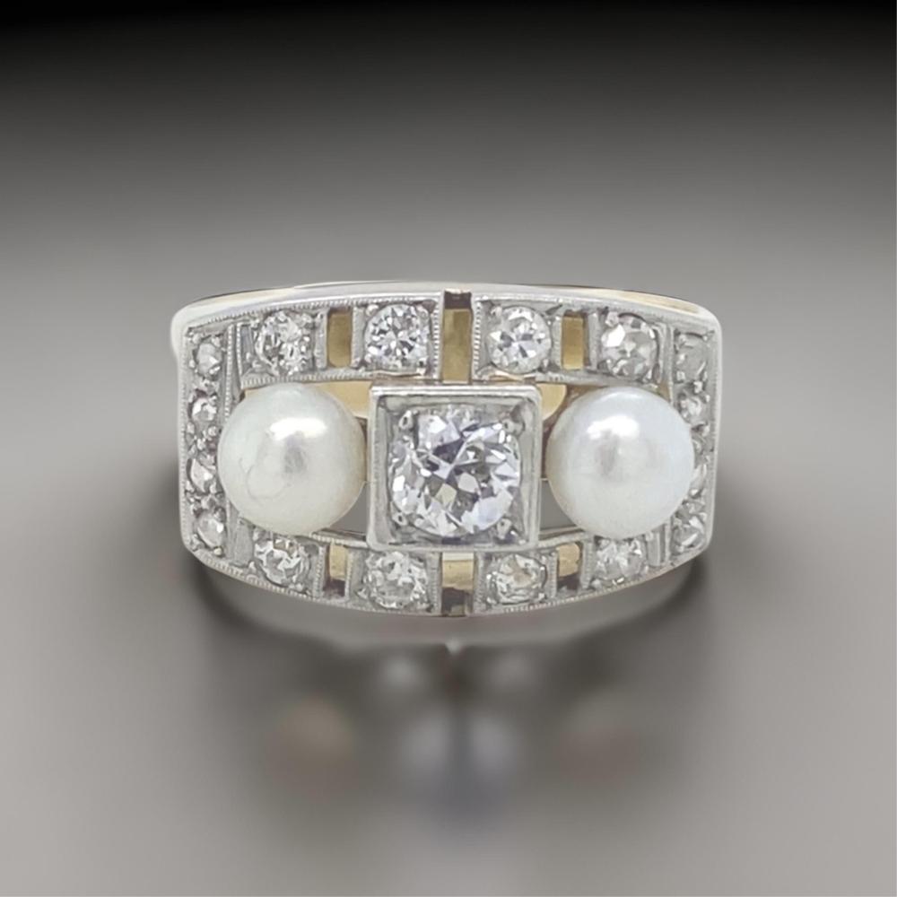 1.00ct Diamond and Pearl 18ct Yellow/White Gold Art Deco Ring. Comes With a Certificate of Valuation of $8,190. One European Cut Diamond (Colour: G, Clarity: VS2) Flanked by Sixteen Round Single/Rose Cut Diamonds Alon... sold by Pottle Auctions, lot 328 — auction record photograph