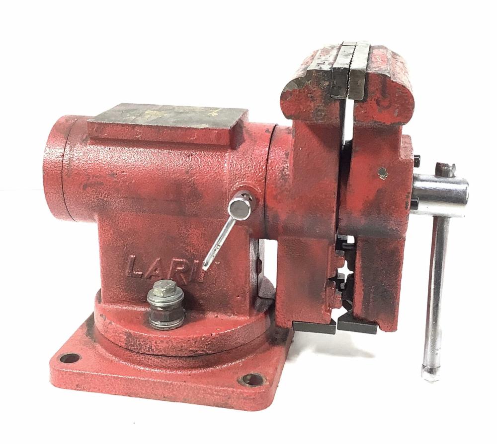 Red metal bench vise with a swiveling base and side handle, shown in a close-up against a white background.