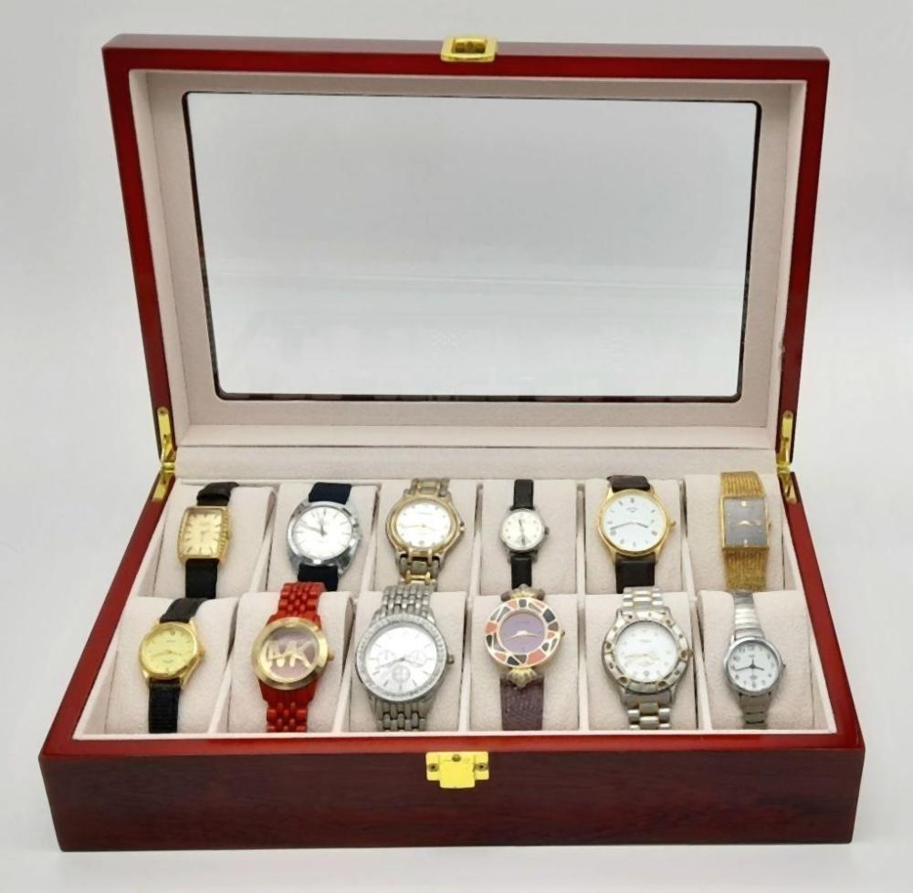 A Piano Finish Wooden 12 Watch Display Box Containing Twelve Good Vintage and Later Watches sold by Cadmore Auctions, lot 571 — auction record photograph