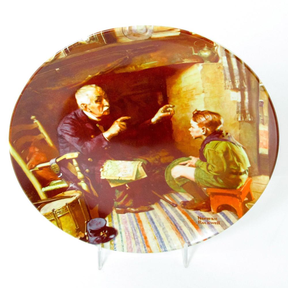 Decorative collectors plate featuring an illustration of a man in uniform speaking with a seated woman, with a child seated nearby.