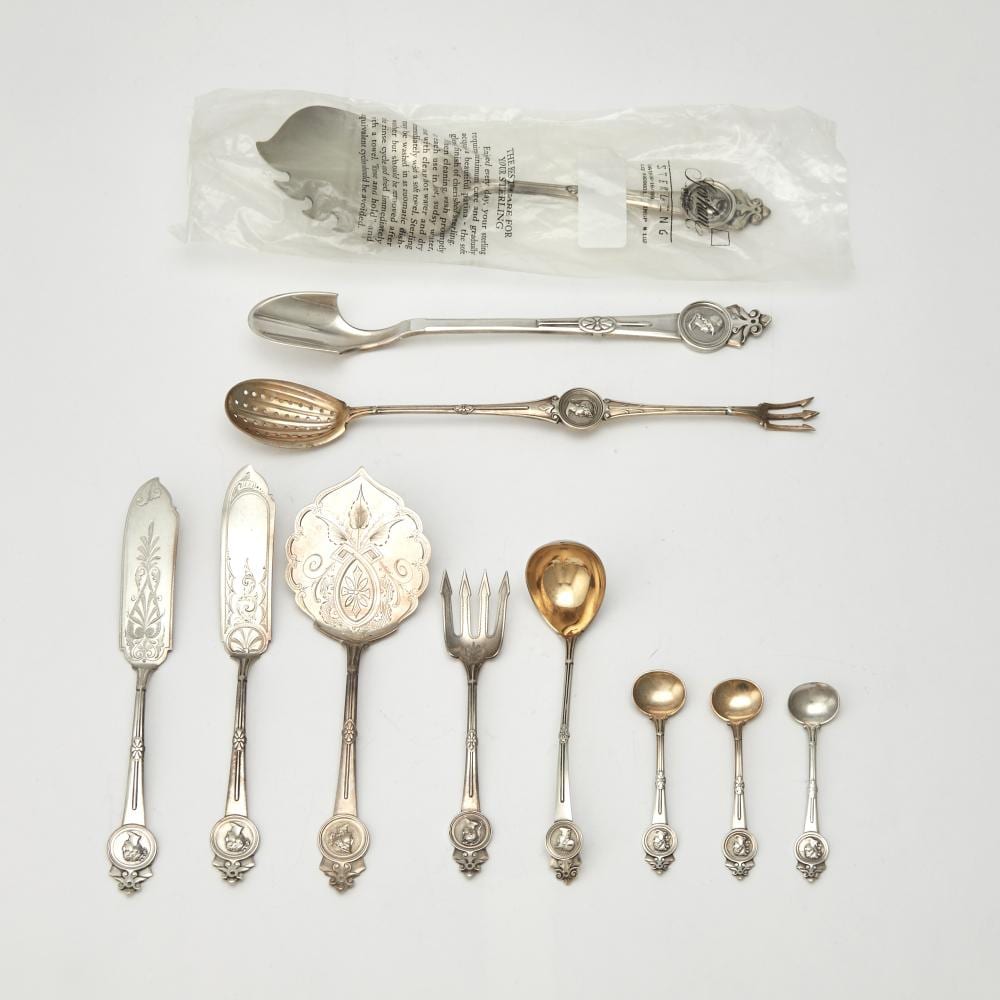 Gorham Silver comparable auction result: group of gorham silver medallion pattern serving pieces mid 19th century