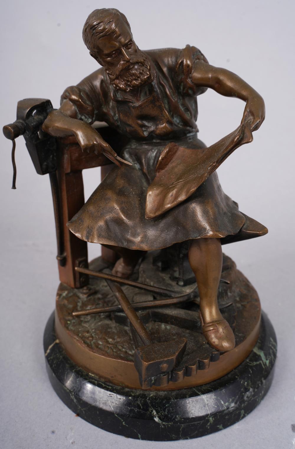 Hans Guradze comparable auction result: antique russian and german bronze statue of a seated blacksmith by hans guradze