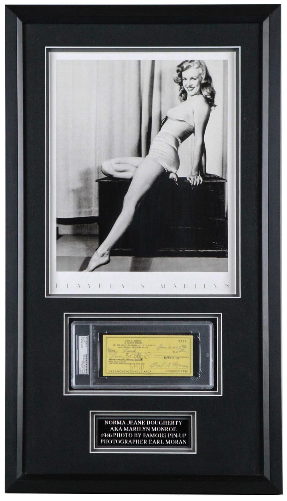 Earl Moran comparable auction result: earl moran signed check with marilyn monroe photograph