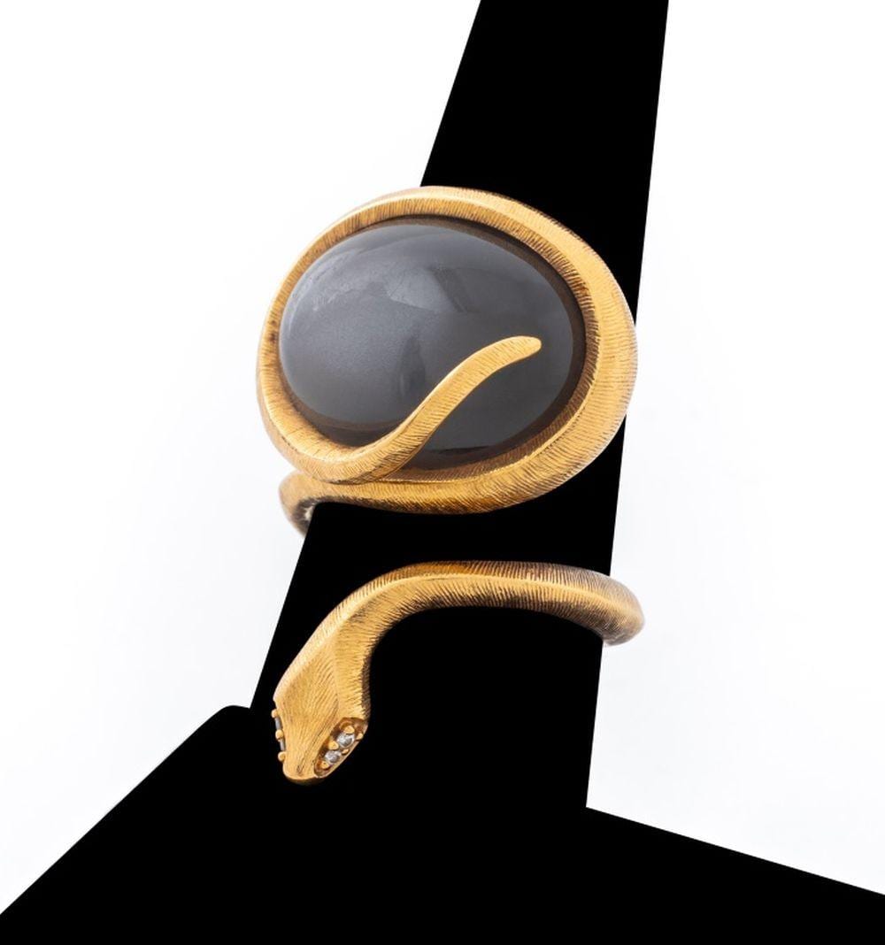 Ole Lynggaard comparable auction result: ole lynggaard 18k moonstone diamond snakes ring