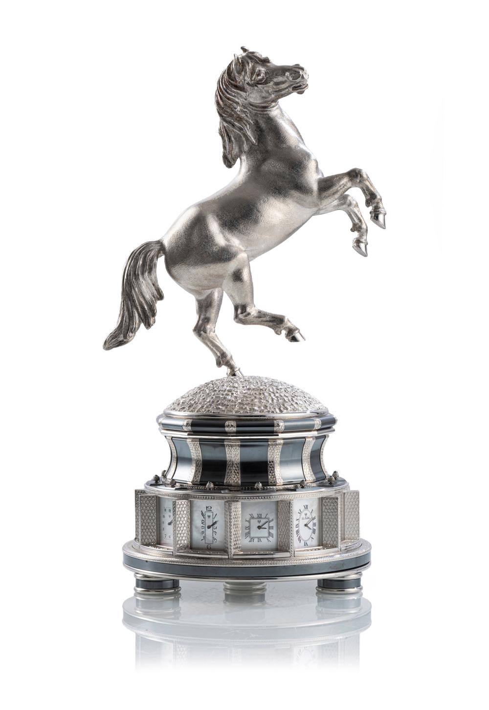 AN EXTRAORDINARY WORLD TIME SILVER TABLE CLOCK WITH HORSE FIGURE - "FREEDOM" sold by Nagel Auction, lot 663 — auction record photograph