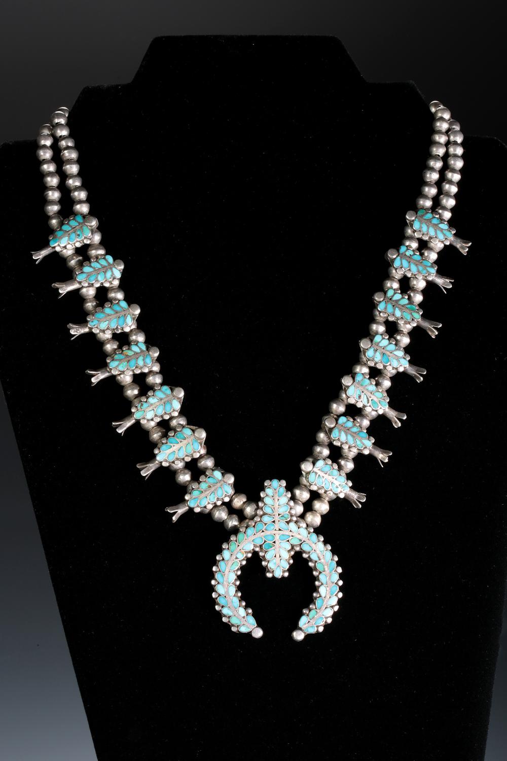 Auction comp thumbnail for Zuni Dishta turquoise & Silver Flush Channel Inlay Squash Blossom Necklace Native American Jewelry (Ace Of Estates, Lot 923308)