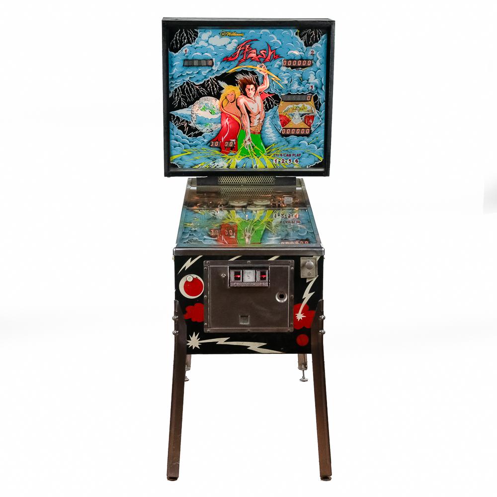 Front view of a Williams flash pinball machine with a character artwork playfield and mechanical control panel.