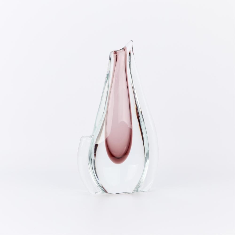 Pink and clear glass vase with a teardrop opening and faceted, rounded sides on a white background.