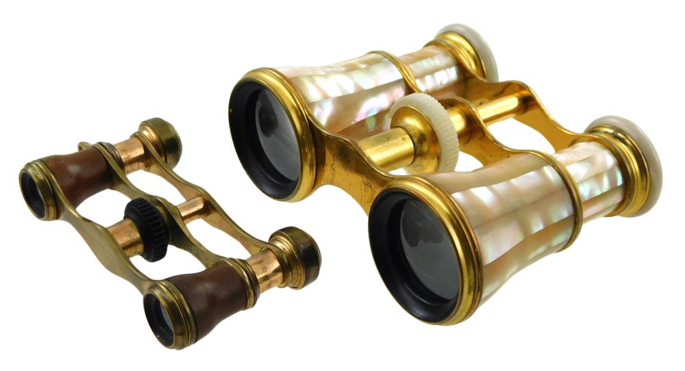 Pair of brass opera glasses with dark lenses and mother-of-pearl–colored striped barrels, shown open and angled against a white background.