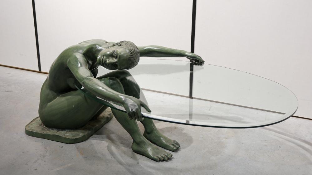 Guido Mariani comparable auction result: guido mariani 1950 a glass and bronze figurative coffee table with a sculpture of a seated nude