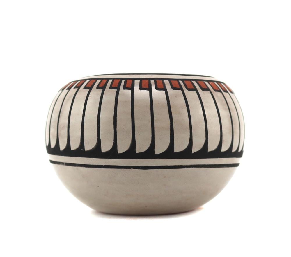 Crucita Gonzales Calabaza comparable auction result: blue corn crucita gonzales calabaza 1921 1999 san ildefonso polychrome jar with feather design c 1950 60s 2 75 x 4