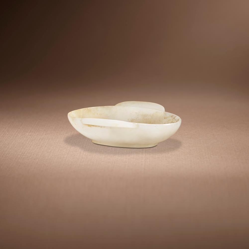 A Superb White Jade Ear Cup. Late Warring States Period - EARLY WESTERN HAN comparable sale