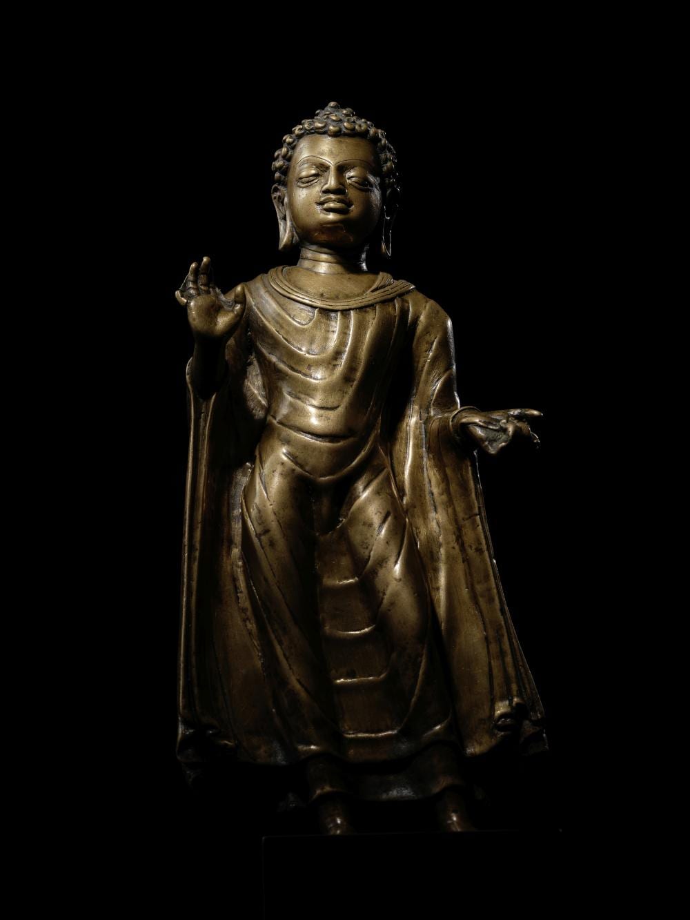 A Brass Figure Of Buddha Shakyamuni North India, GUPTA PERIOD, LATE 6TH/EARLY 7TH CENTURY comparable sale