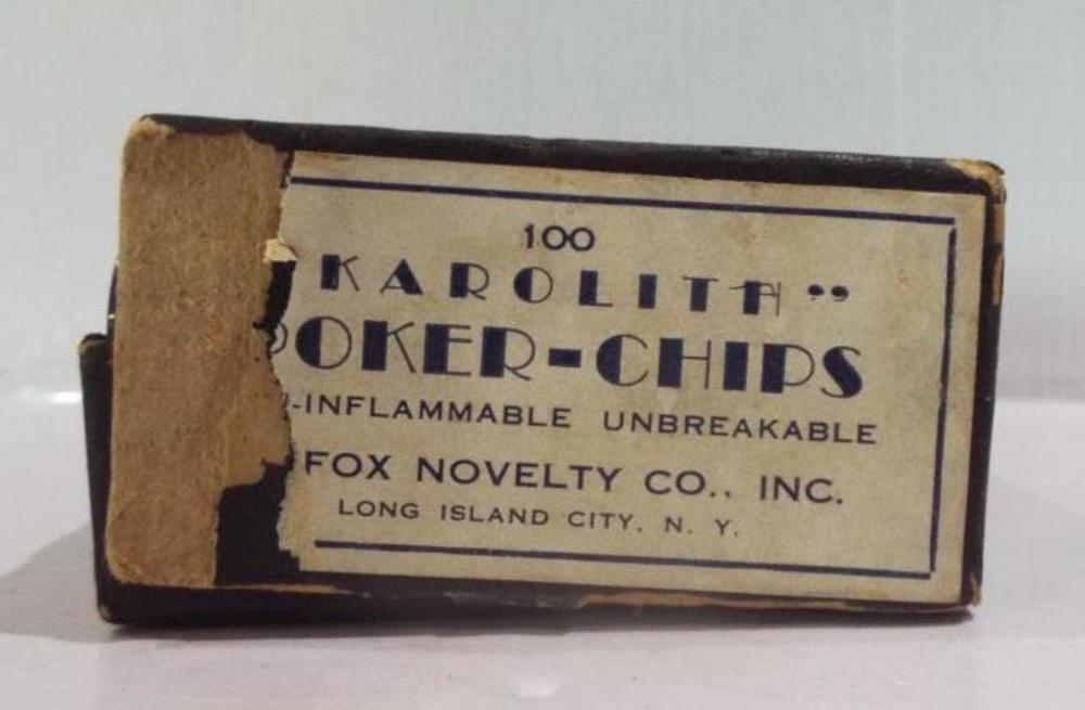 Vintage box label reading “KAROLITH  • O K E R-CHIPS” with “FOX NOVELTY CO., INC.” and “LONG ISLAND CITY, N.Y.” printed on a cardboard package.