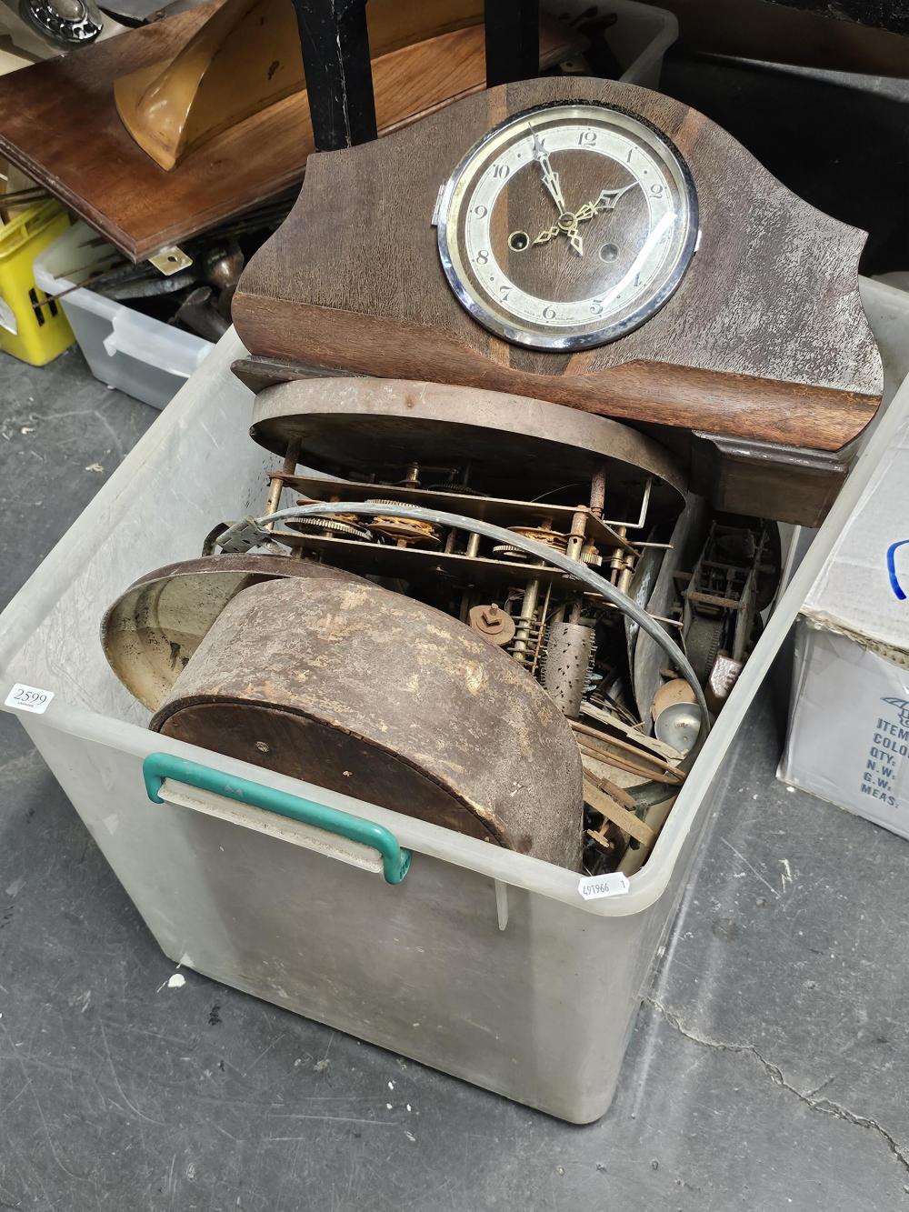 Five tubs of various sundries incl. guitars, tools, mantel clocks, meat grinder, phones, etc. sold by Lawsons, lot 2599 — auction record photograph