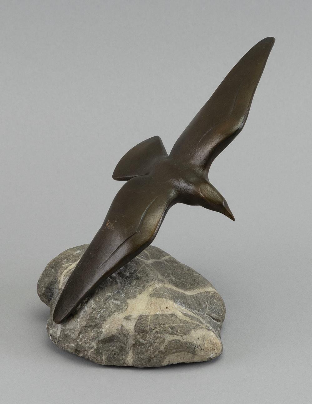 Charles Reussner comparable auction result: charles reussner france 1886 1961 gull in flight bronze on a stone base height 5 length across wings 7 5 base length 4