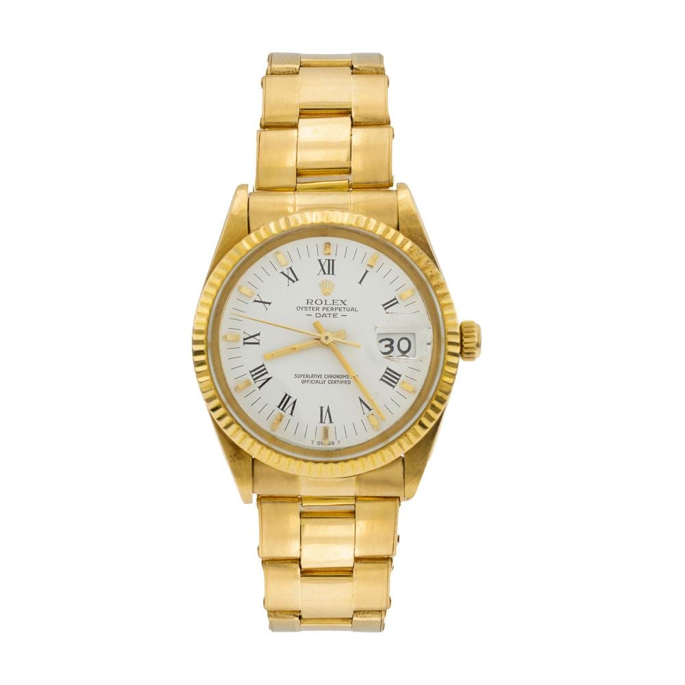 Gold wristwatch with a white dial showing Roman numerals and a date window at 3 o’clock.